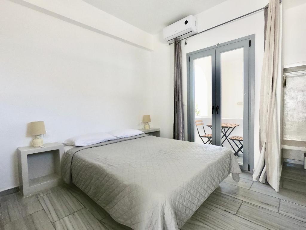 Ένα ή περισσότερα κρεβάτια σε δωμάτιο στο Anny Studios & Rooms Perissa Beach