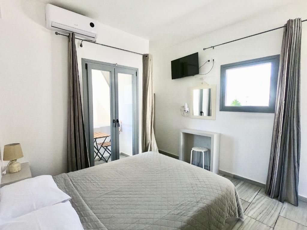 Ένα ή περισσότερα κρεβάτια σε δωμάτιο στο Anny Studios & Rooms Perissa Beach