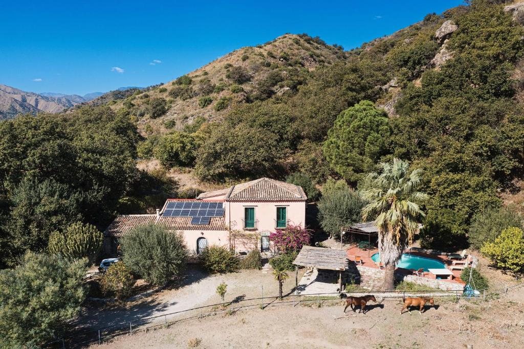 an image of a house with a mountain at Villa Idyllica in Gaggi