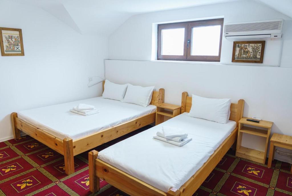 Postel nebo postele na pokoji v ubytování Hostel km 0