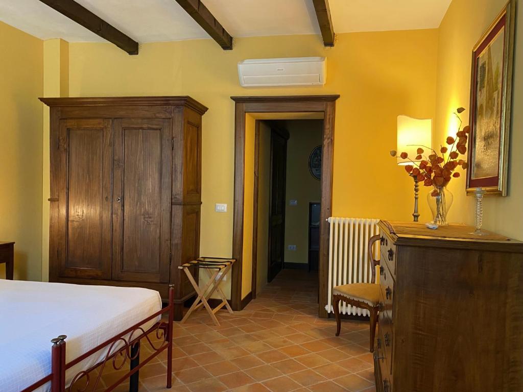 Posteľ alebo postele v izbe v ubytovaní B&B Tenuta Montegrande