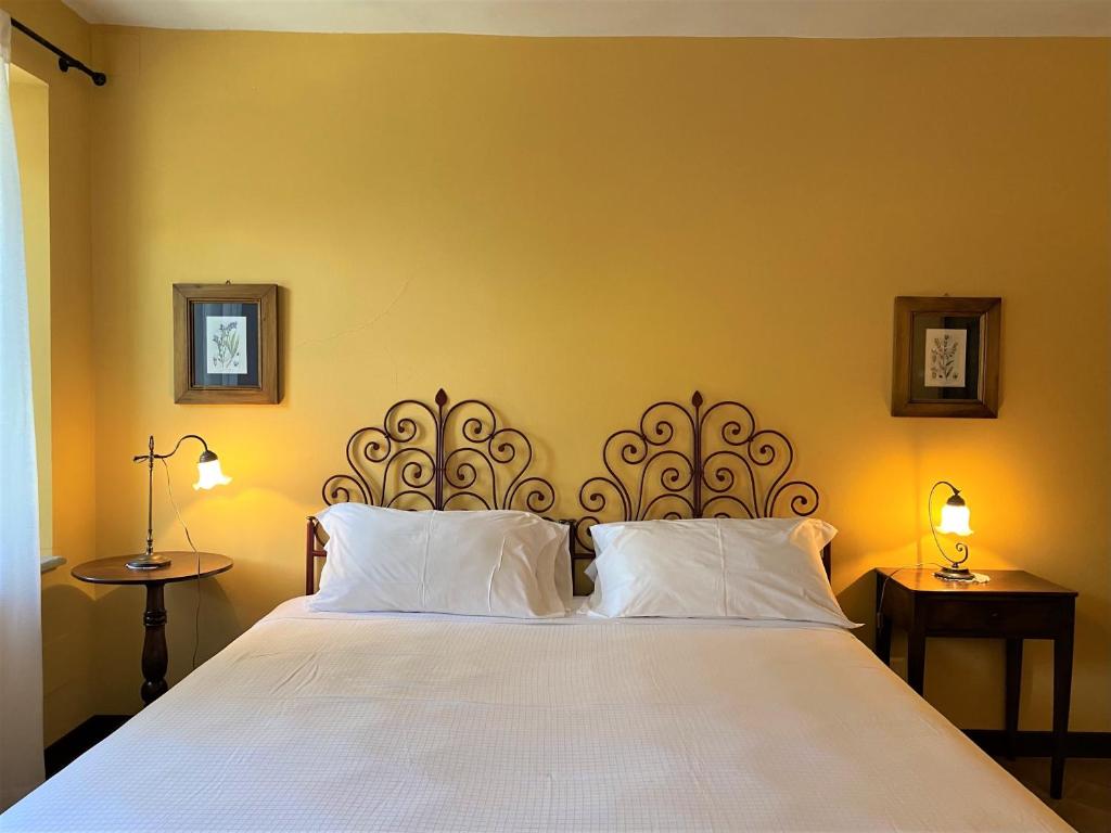 Posteľ alebo postele v izbe v ubytovaní B&B Tenuta Montegrande
