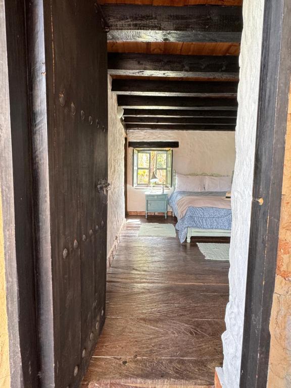 Postel nebo postele na pokoji v ubytování Casona Ananda