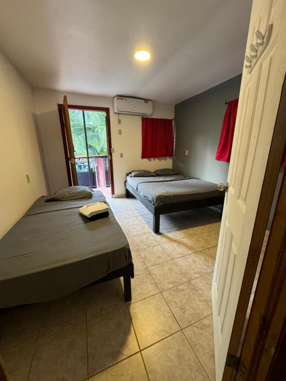 Postel nebo postele na pokoji v ubytování CASA FOTR LOCO