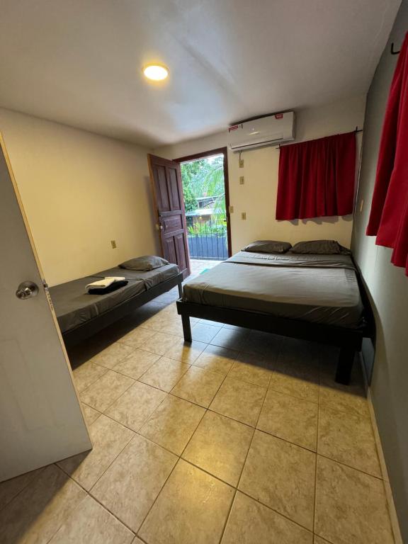 Postel nebo postele na pokoji v ubytování CASA FOTR LOCO