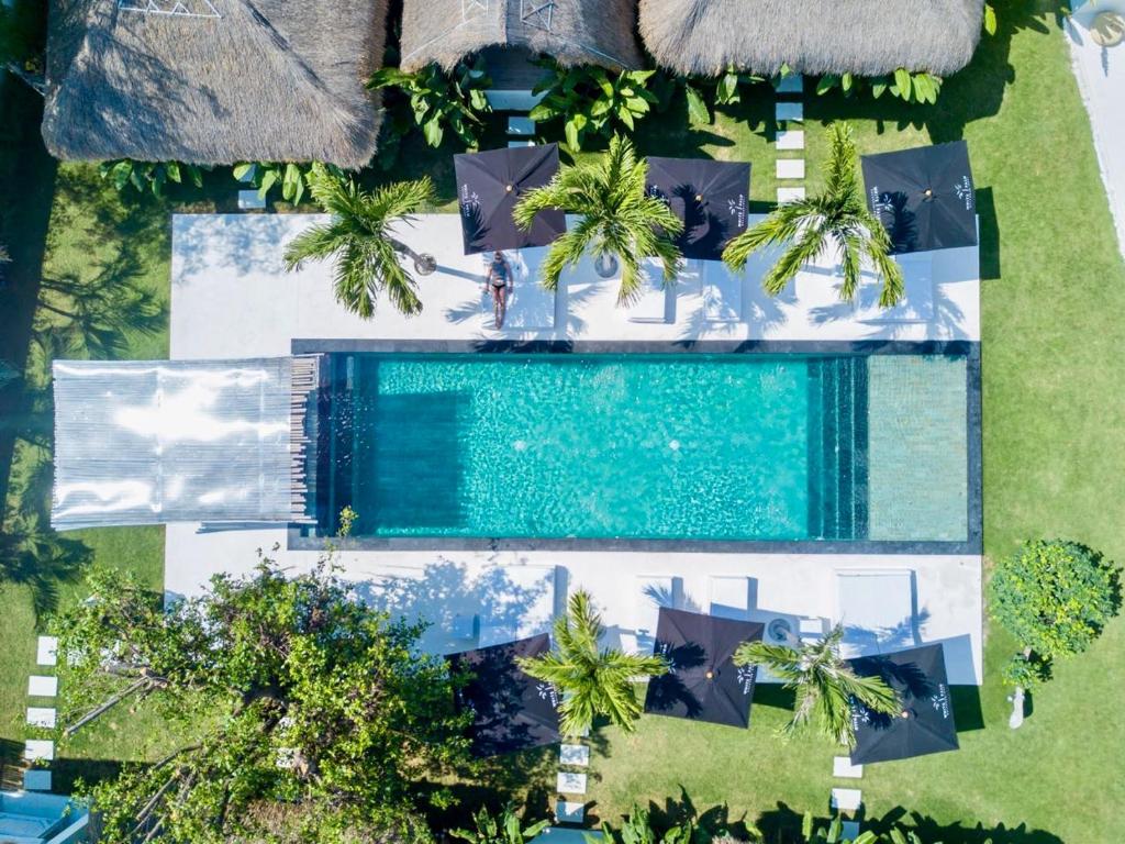 Bazén v ubytování White Palm Hotel Uluwatu Bali nebo v jeho okolí