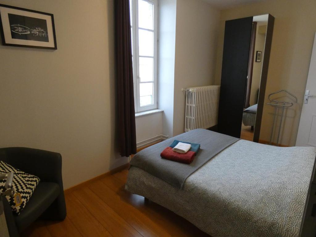 Postel nebo postele na pokoji v ubytování Gîte la loutière