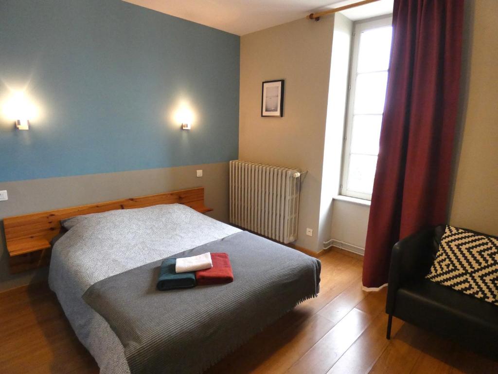 Postel nebo postele na pokoji v ubytování Gîte la loutière