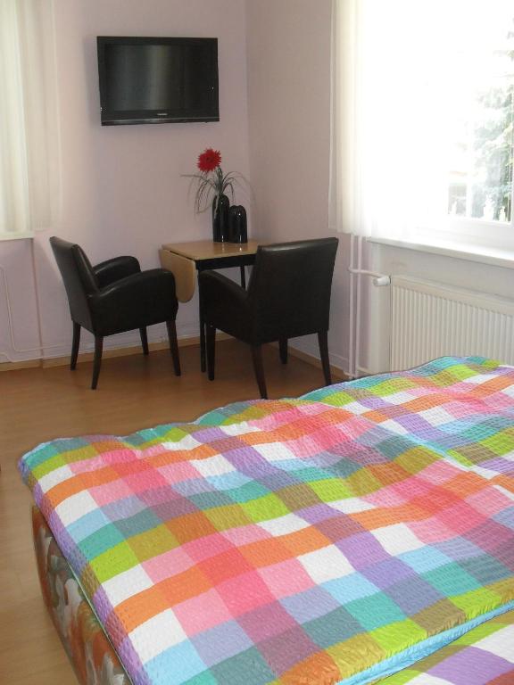 Postel nebo postele na pokoji v ubytování Pension Rak