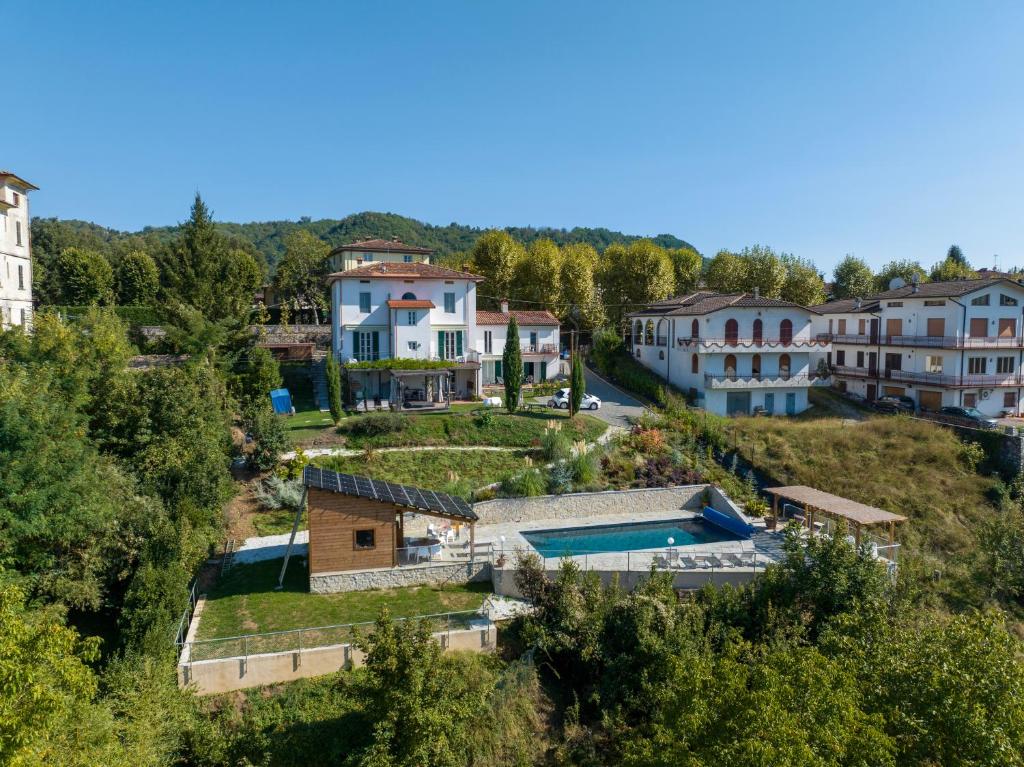 an aerial view of a large estate with houses at Villa Pavone in Coreglia Antelminelli