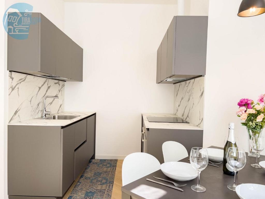 A kitchen or kitchenette at San Lazzaro 232 Tirabora Short Rent