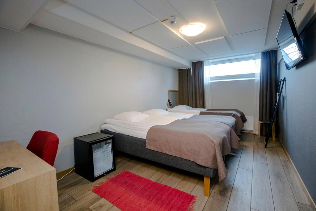 Postel nebo postele na pokoji v ubytování HOSTEL TOIVOLA