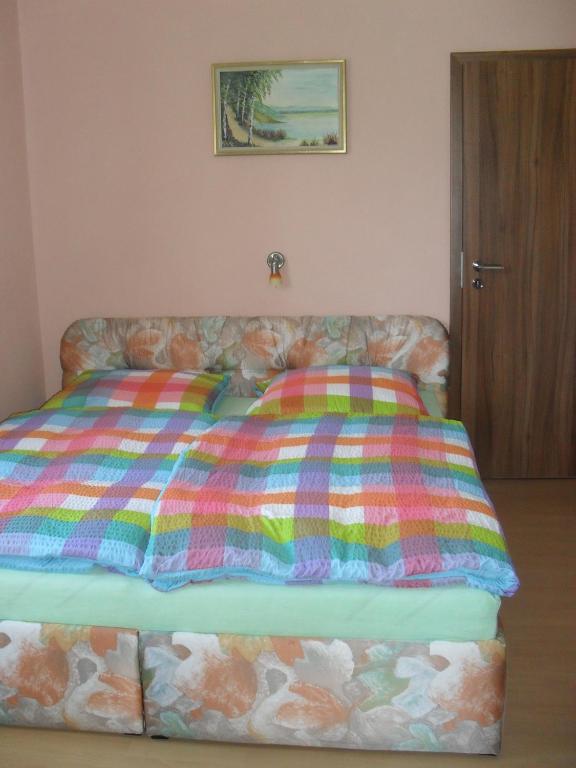 Postel nebo postele na pokoji v ubytování Pension Rak