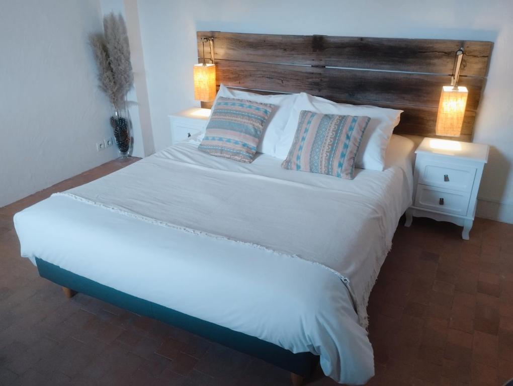 Voodi või voodid majutusasutuse Magnolias toas