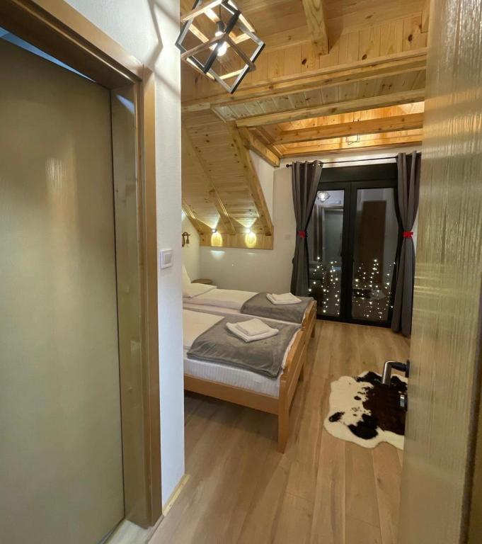 Postel nebo postele na pokoji v ubytování Villa Villekulla VV