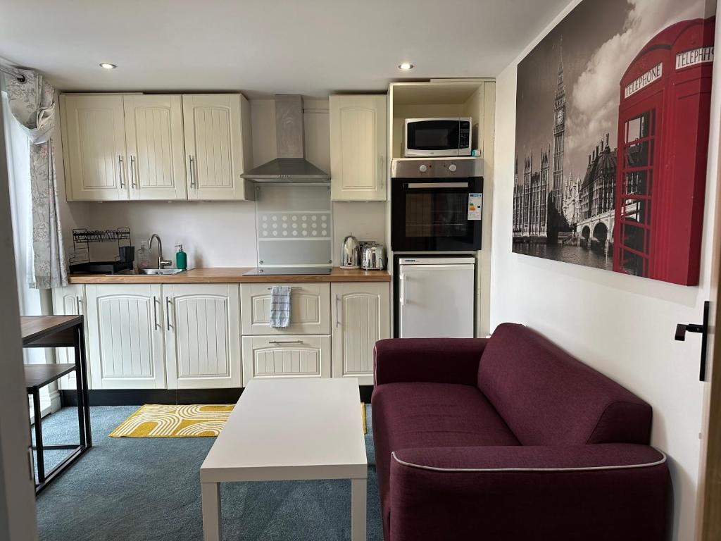 Private self-contained flat with shared entrance and live in hosts