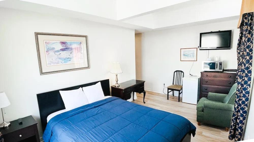 Cama o camas de una habitación en Commons Inn