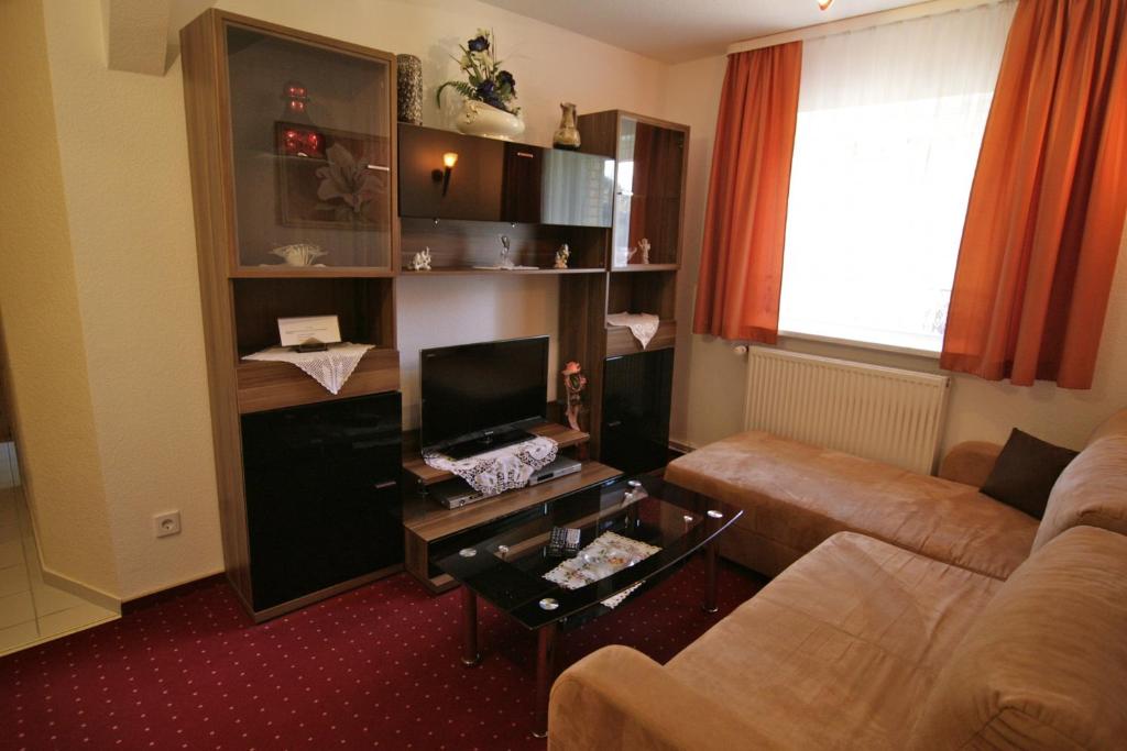 TV a/nebo společenská místnost v ubytování Hotel Restaurant Rehberg