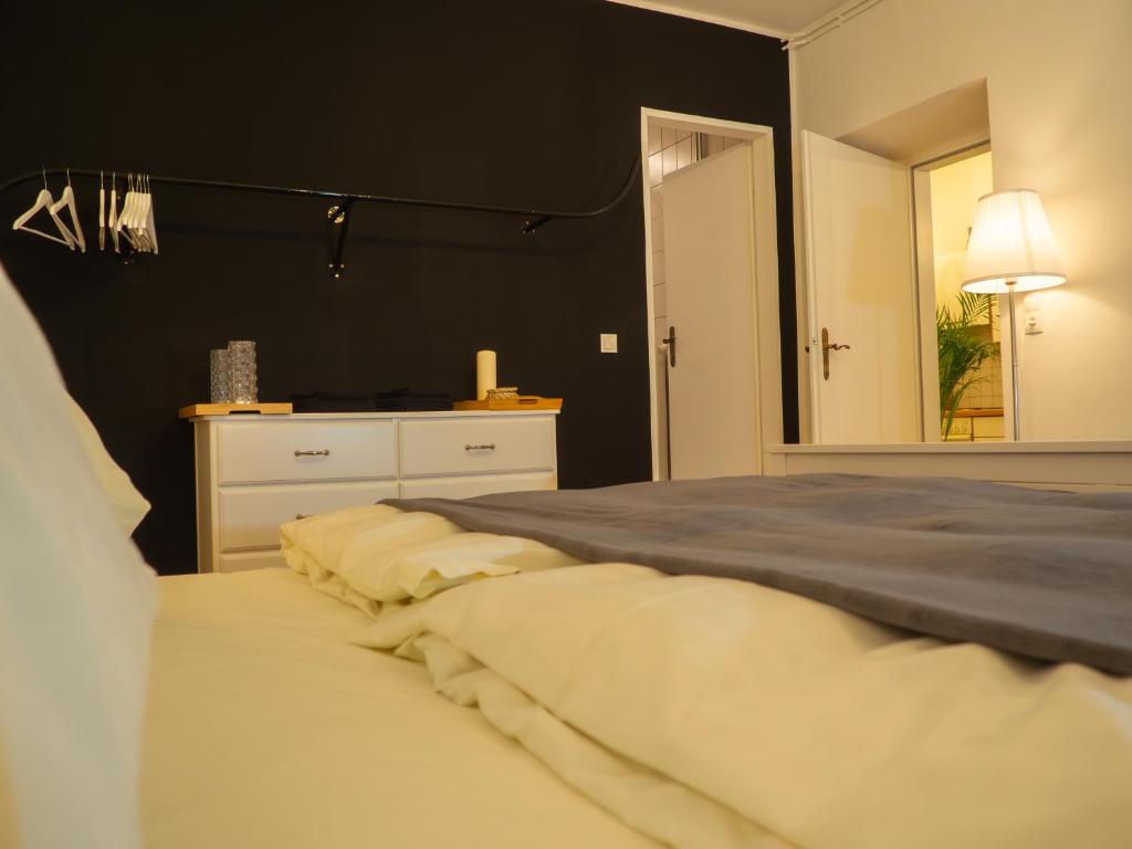 Postel nebo postele na pokoji v ubytování RM Appartements