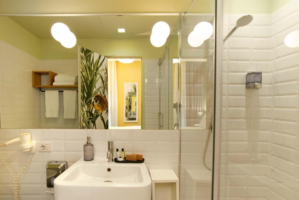 Koupelna v ubytování Hotel Elite