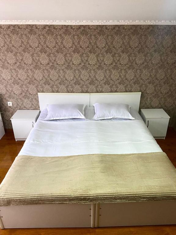Postel nebo postele na pokoji v ubytování Hotel Doko