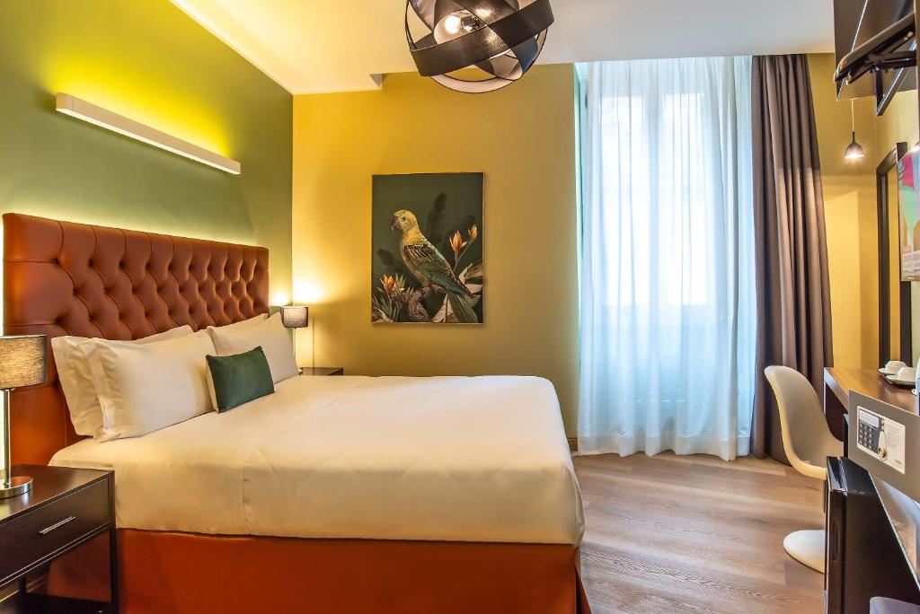 Postel nebo postele na pokoji v ubytování Hotel Elite
