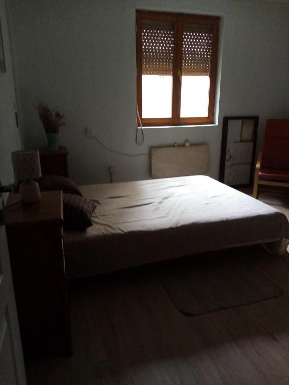 Postel nebo postele na pokoji v ubytování Stan na dan, miran kraj