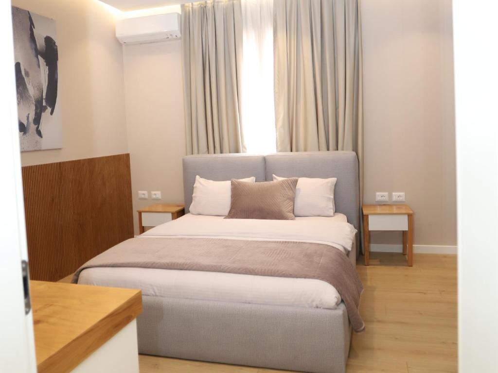 Postel nebo postele na pokoji v ubytování J&D Rooms Korce
