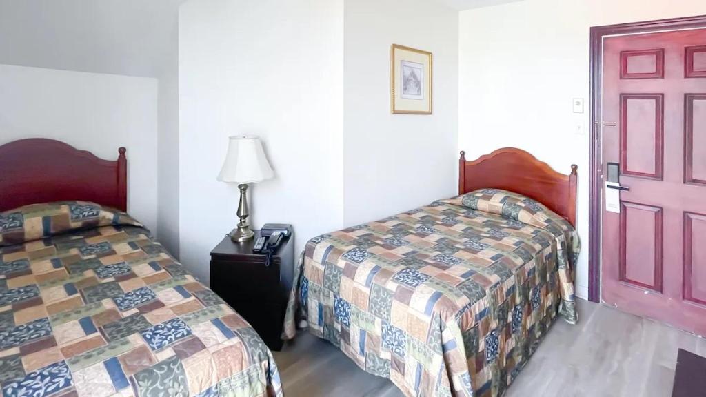 Cama o camas de una habitación en Commons Inn