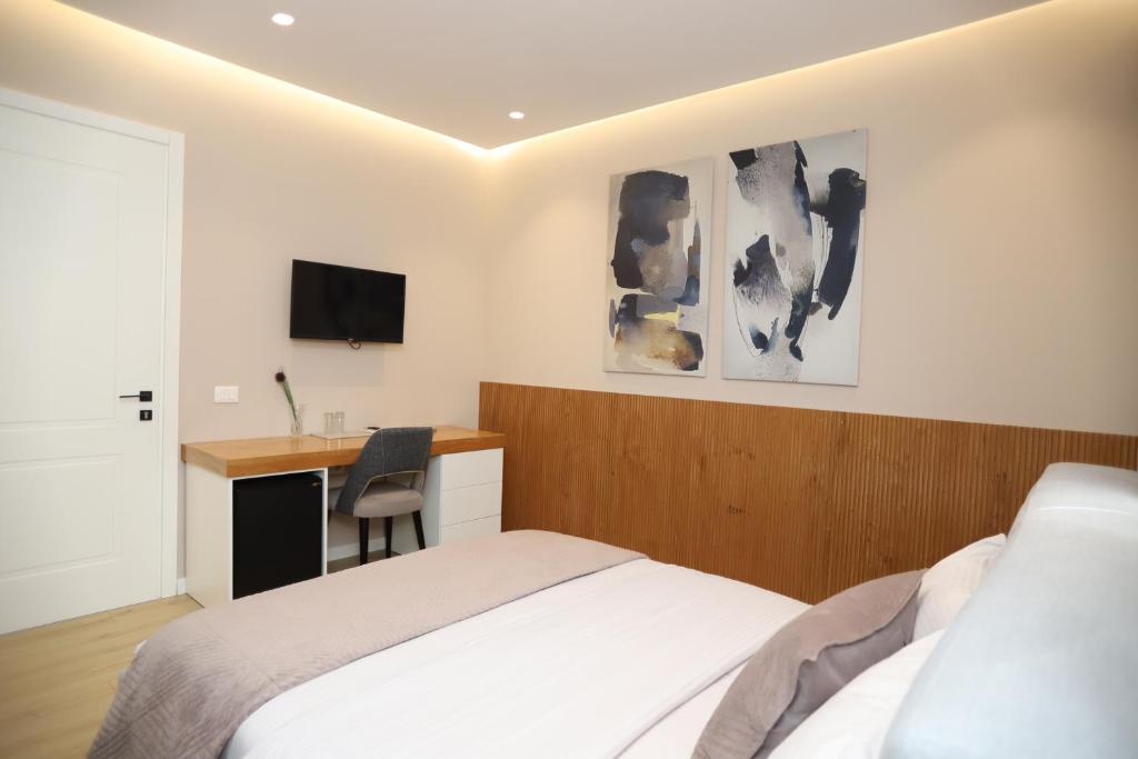 Postel nebo postele na pokoji v ubytování J&D Rooms Korce