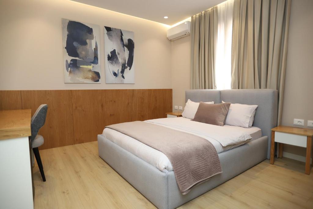 Postel nebo postele na pokoji v ubytování J&D Rooms Korce
