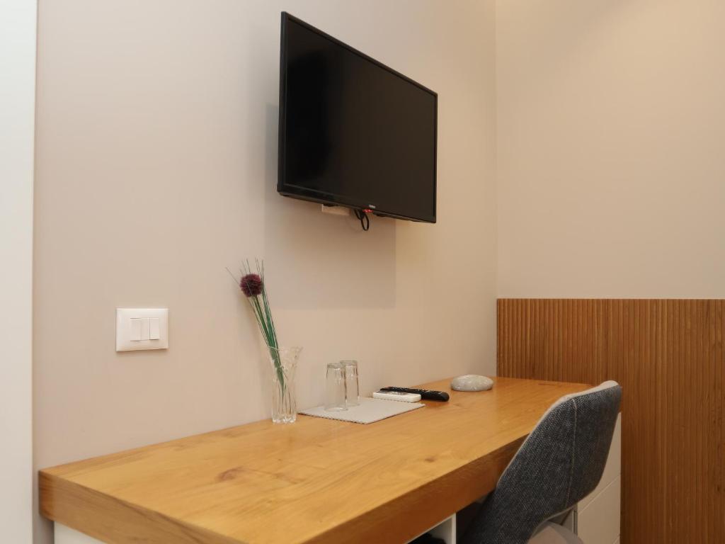 TV a/nebo společenská místnost v ubytování J&D Rooms Korce