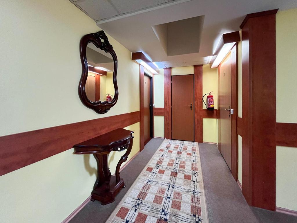 Postel nebo postele na pokoji v ubytování Hotel Závrší