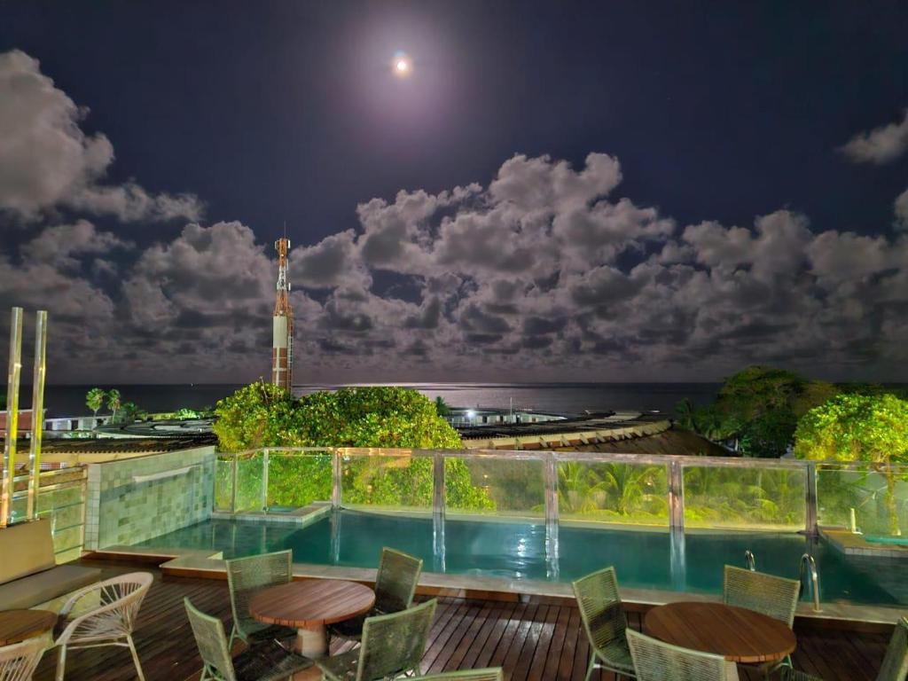 A piscina localizada em Linda cobertura vista mar ou nos arredores