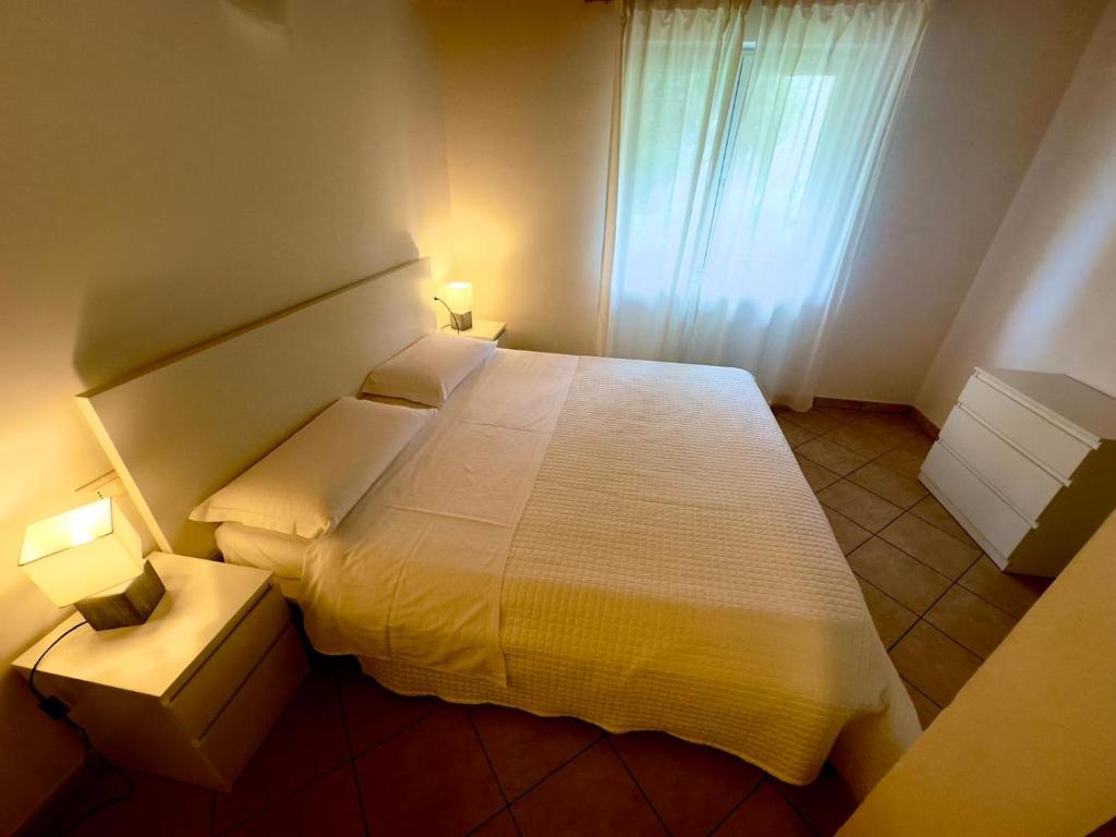 Postel nebo postele na pokoji v ubytování Hotel Casa Piantoni