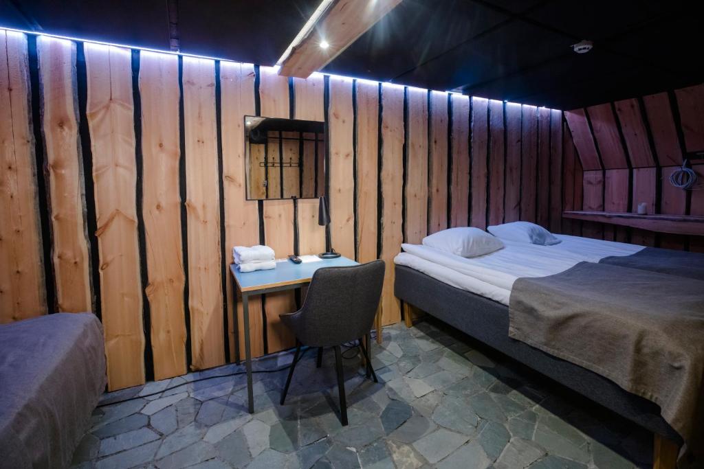 Postel nebo postele na pokoji v ubytování HOSTEL TOIVOLA