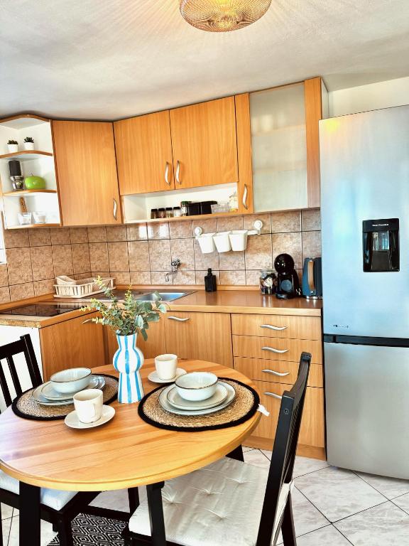 Kuchyň nebo kuchyňský kout v ubytování Apartments Lorena