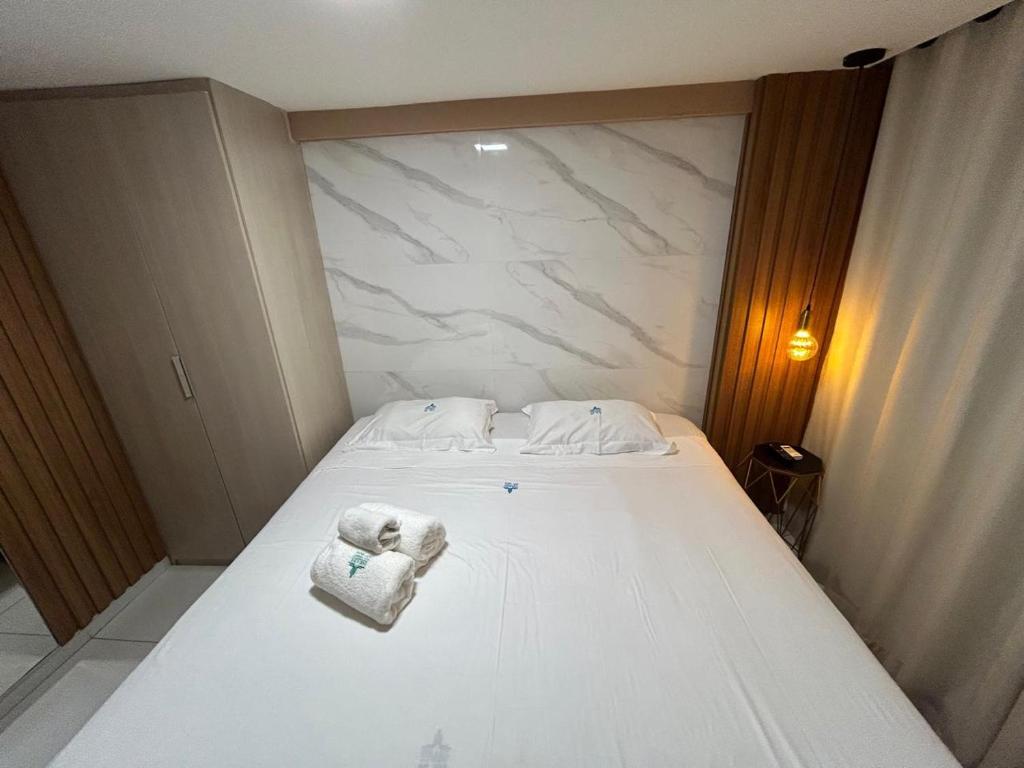 Cama ou camas em um quarto em Linda cobertura vista mar