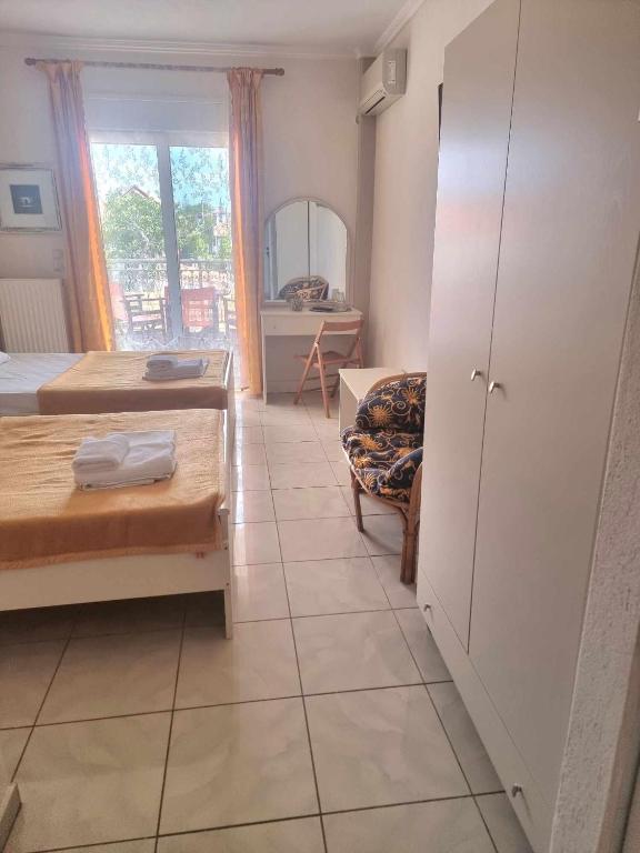 Postel nebo postele na pokoji v ubytování Hotel Nautilos