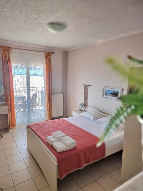 Postel nebo postele na pokoji v ubytování Hotel Nautilos