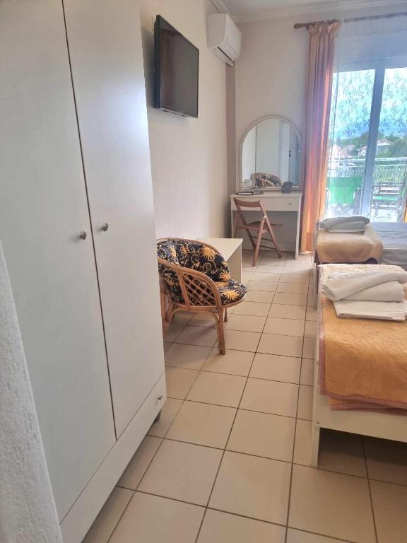 Postel nebo postele na pokoji v ubytování Hotel Nautilos
