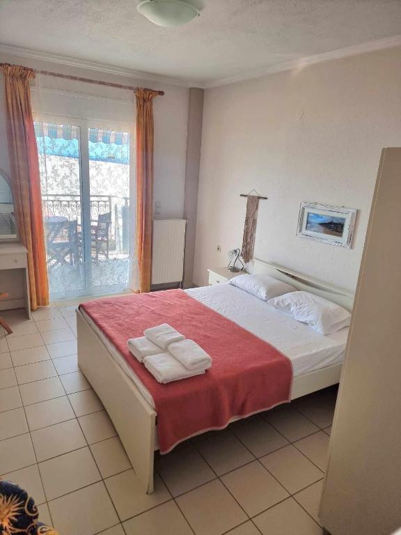Postel nebo postele na pokoji v ubytování Hotel Nautilos