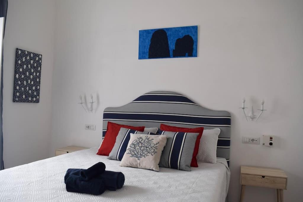 Postel nebo postele na pokoji v ubytování Casa Vera, Capri