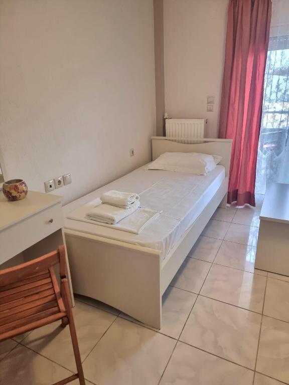 Postel nebo postele na pokoji v ubytování Hotel Nautilos
