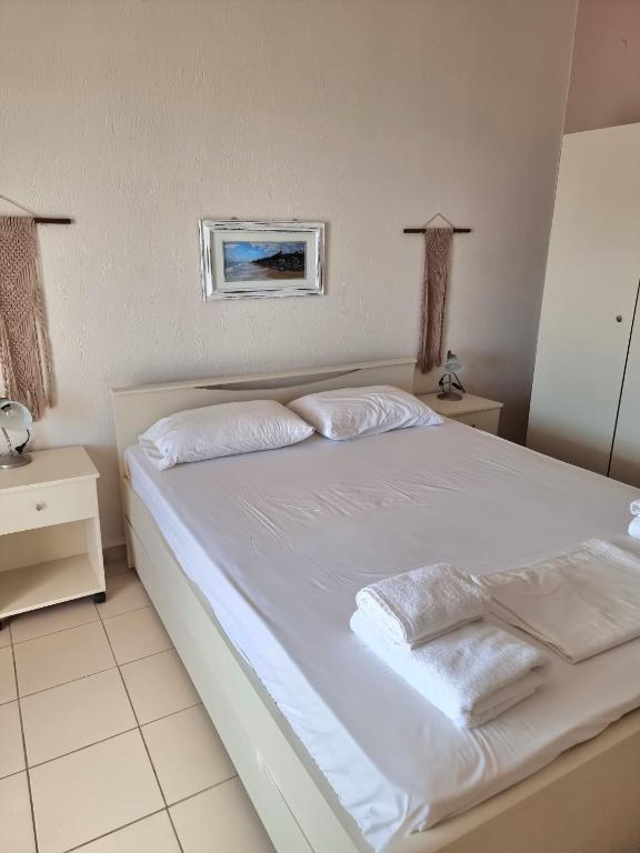 Postel nebo postele na pokoji v ubytování Hotel Nautilos