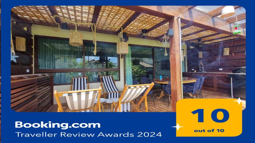 En restaurant eller et andet spisested på Apartamento terreo no reserva dos Carneiros