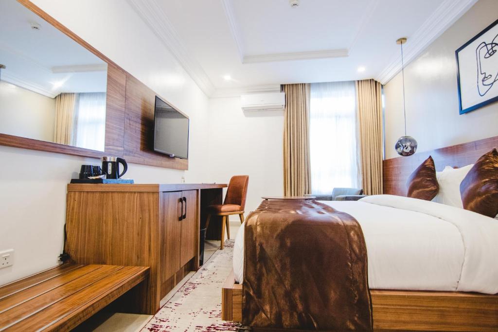 TV a/nebo společenská místnost v ubytování BON Hotel Imperial