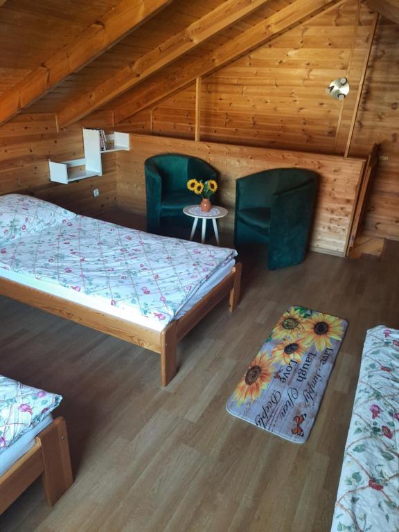 Postel nebo postele na pokoji v ubytování Apartamenty u" Lusi"