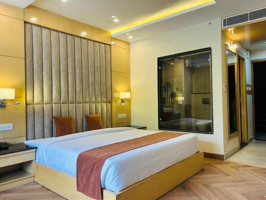 Ліжко або ліжка в номері Mulberry Resorts & Spa
