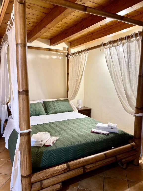 Postel nebo postele na pokoji v ubytování B&B Antico Caricatore